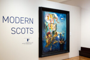 A large painting displayed on a white wall next to the text "Modern Scots" and the Recognised Collection logo.